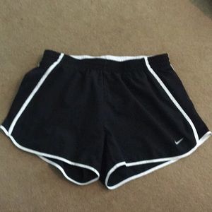 Black Nike running shorts